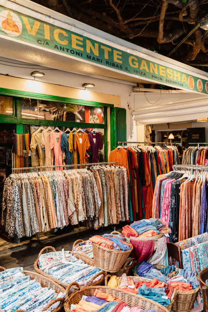 Colorful clothing and textiles displayed at Vicente Ganesha shop in Ibiza