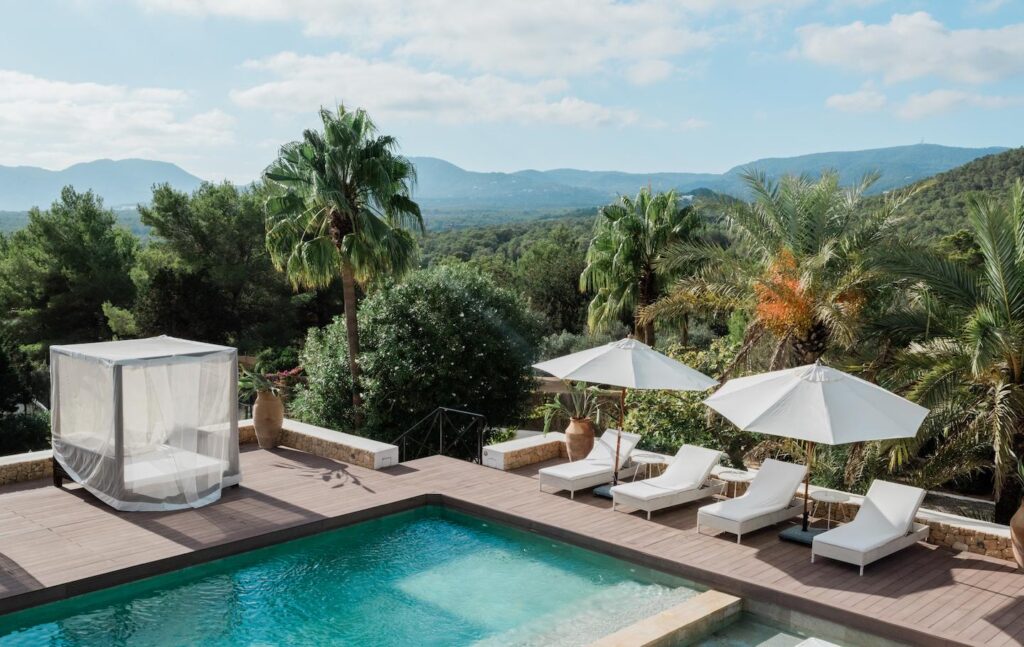 Panoramic view of Casa Amalia’s pool, terrace and surrounding hills