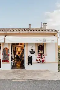 The shop front of Bome boutique in San Miguel Ibiza, selling handcrafted leather, textiles and jewellry close to the church of San Miguel Ibiza