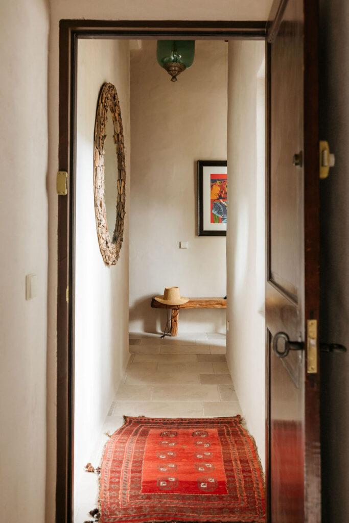 finca-llumera-ibiza-villa-corridor-hat-bench