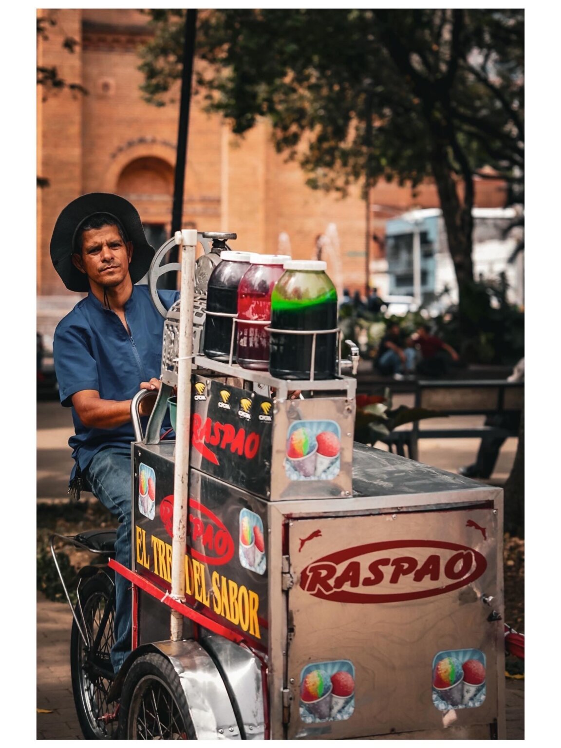Street food vendor serving refreshments in Medellín, Colombia