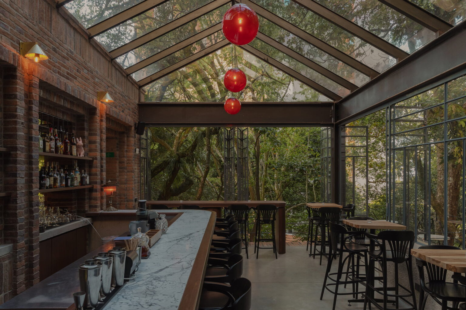 Bar and dining area at Ocio restaurant in Medellín